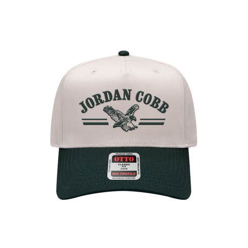 Eagle and 'Jordan Cobb' embroidered on the front of a twill hat in green/natural